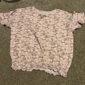 The brand is place and it’s a 10/12 size really good it’s brand new no tag on it